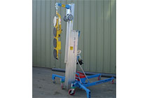 material hoist with inline glass lifter